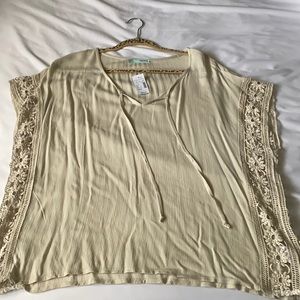 Cream tunic with floral lace appliqué sleeves